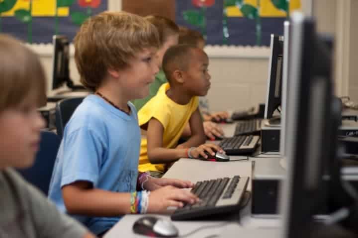 Kids in class on computers